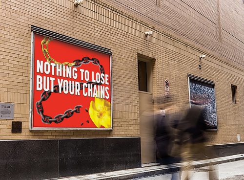 Billboard with message 'Nothing to lose but your chains'